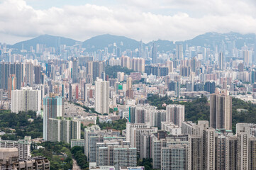 Fototapeta premium View of Hong Kong and Kowloon from Lion Rock Head. Panorama of Hong Kong, skyscrapers and nature.