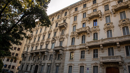 Italian Building Facade with Balconies and Shutters