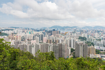 View of Hong Kong and Kowloon from Lion Rock Head. Panorama of Hong Kong, skyscrapers and nature.