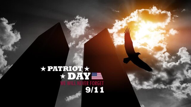 Silhouette of Towers with soaring eagle on background of black and white sky. 09.11.2001 American Patriot Day video. Video with inscription.
