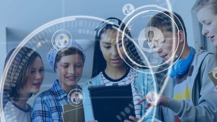 Girl showing tablet content while classmates tapping screen activating network graphic for learning - Powered by Adobe
