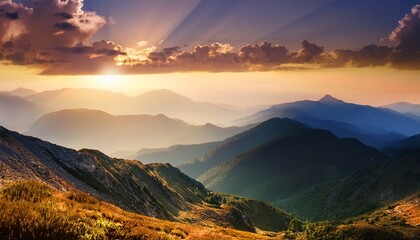 Obraz premium majestic mountains with rays of sunlight at sunrise illuminated sky and soft hues