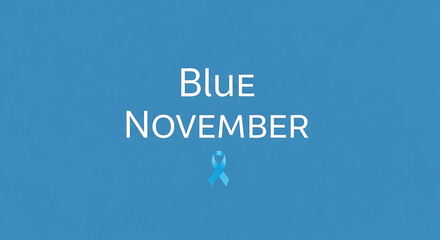 Blue november text with light blue ribbon on a blue background for prostate cancer awareness month