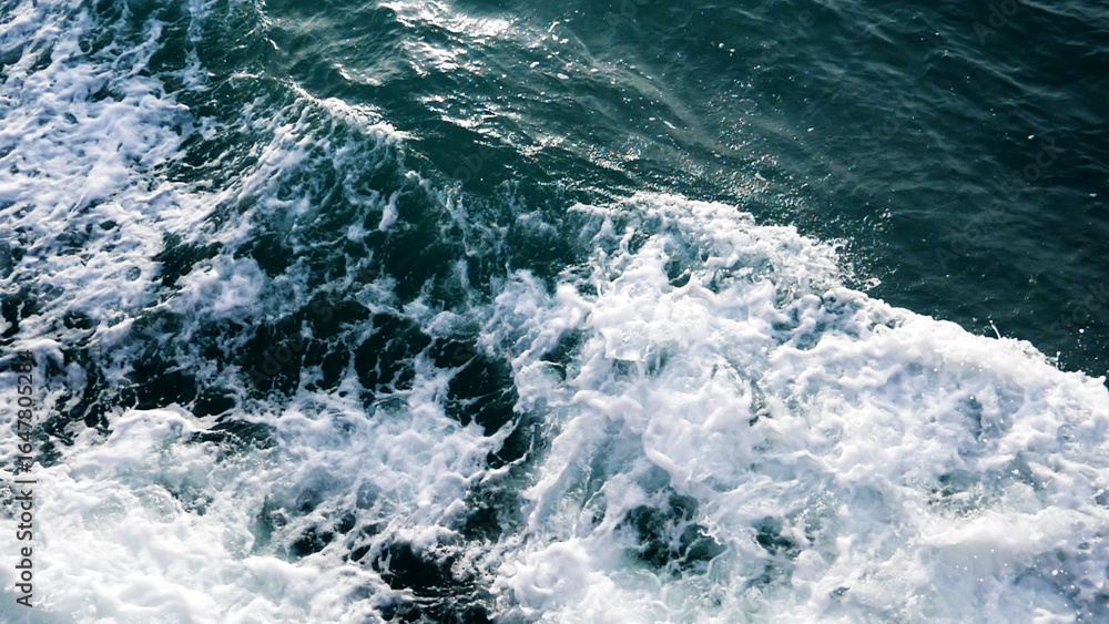 Poster oceanic texture: a mesmerizing shot of the ocean's surface, capturing the intricate patterns of wave