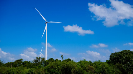 Wind Turbine Powering the Future: Capturing a clean energy future, with wind turbines gracefully...