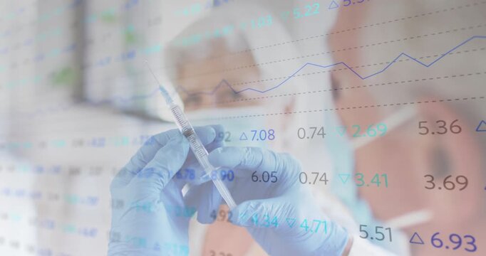 Gloved hands rotating and tapping syringe for injection priming under subtle medical data overlay