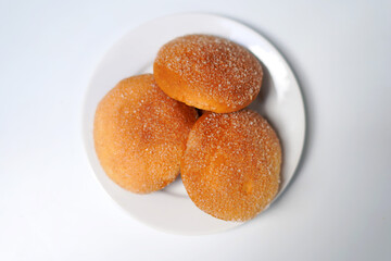 sugar with cookies on the white dish