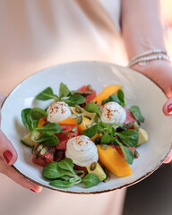 A Fresh and Colorful Salad with Creamy Toppings and Crispy
