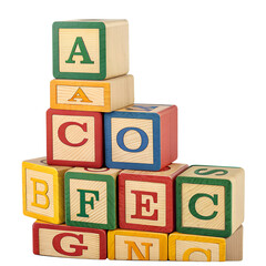 (Wooden Alphabet Blocks) &mdash; Colorful wooden alphabet blocks stacked, isolated on transparent background