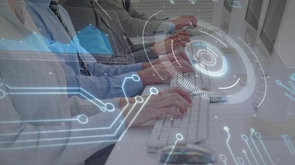 Colleagues typing on keyboards initiating HUD overlay fading and rotating for data visualization - Powered by Adobe