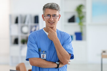 Fototapeta premium Portrait of doctor in scrubs at clinic