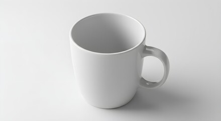 Obraz premium White ceramic mug sits on clean surface. Minimal style for product staging, branding mockups, and website design.