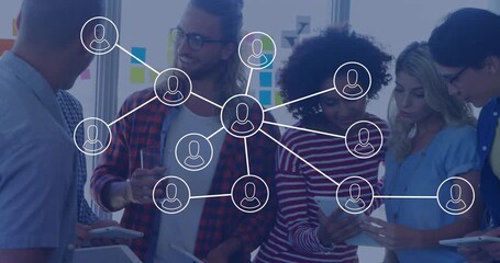 Business team reviewing tablets activating network nodes morphing into user icons for collaboration - Powered by Adobe