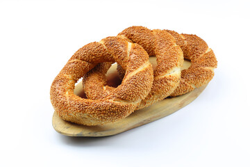 Turkish traditional bagel / simit with sesame on white background, turkish breakfast pastry concept