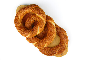 Turkish traditional bagel / simit with sesame on white background, turkish breakfast pastry concept