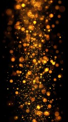 Fototapeta premium Golden bokeh lights cascading in a dark background creating a magical atmosphere during a festive celebration
