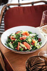 A Colorful and Vibrant Salad Featuring Salmon and Fresh Greens
