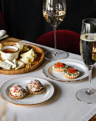 An Elegant Dining Setting featuring Gourmet Dishes accompanied by Fine