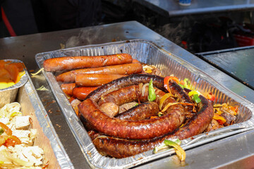 grilled sausages on the grill