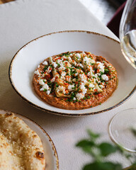 Enjoy the delicious authentic Turkish Lahmacun made with fresh ingredients