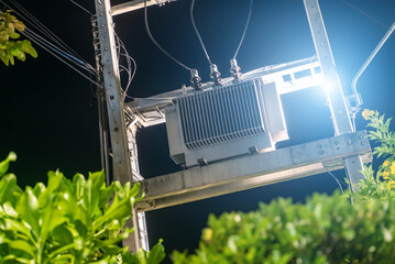 Power Transformer on Utility Pole at Night