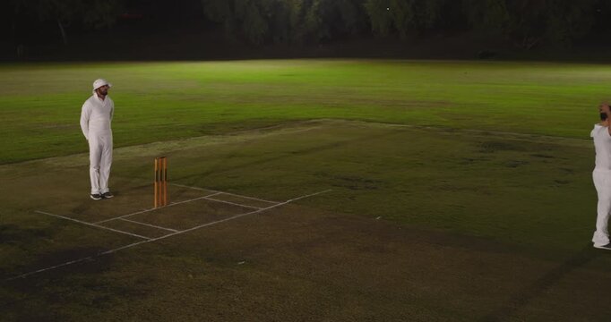 Bowler bowling ball triggers Indian batsman sprinting for single and flicking bails causing runout