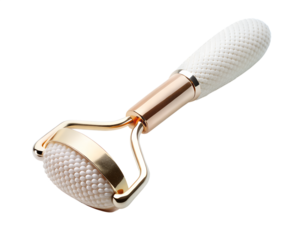 Gold and white face roller massager tool for skincare isolated on transparent background