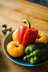 Healthy vegetable salad with tomatoes, peppers, cucumbers, onion and cheese.