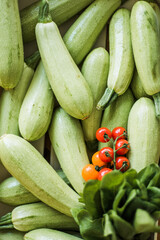 Fresh organic zucchini, raw vegetables for cooking and healthy diet.