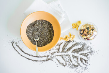 Healthy breakfast with yogurt, granola and chia seeds.