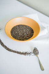 Healthy breakfast with yogurt, granola and chia seeds.