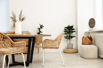 Stylish table with chairs and decor in dining room. Interior design