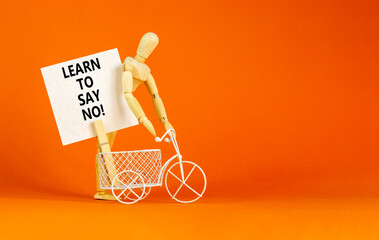 Learn to say no symbol. Concept words phrase Learn to say no on beautiful white paper on wooden...