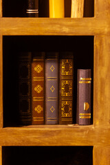 Antique books manuscript on shelv