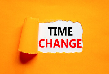 Time change symbol. Concept word Time change on beautiful white paper. Beautiful orange paper...