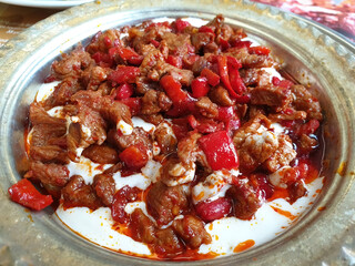 Ali Nazik dish served with smoky eggplant puree and tender grilled meat, traditional Turkish cuisine.