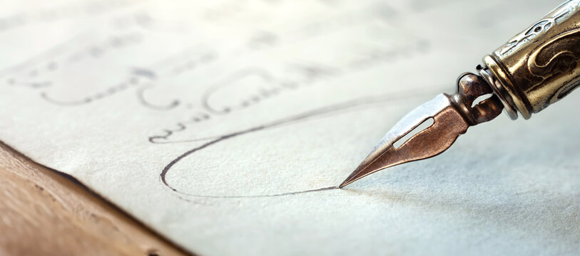 Fountain pen on an antique handwritten letter. Vintage nib pen and handwritten english cursive style font copperplate, spencerian. 