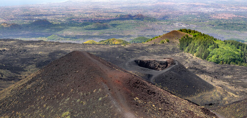Several secondary craters on the hills surrounding the main. crater of Mount Etna, Sicily, Italy