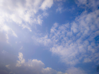 Bright Blue Sky with Fluffy Clouds
