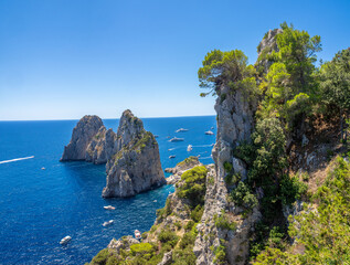 Fototapeta premium Impressive rock formations and sea stacks along the scenic Pizzolungo Trail, Capri, Campania, Italy
