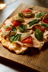 Gourmet Flatbread Pizza with Fresh Basil and Tomatoes