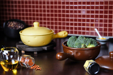 Fresh Broccoli and Various Cooking Ingredients Arranged Carefully in a