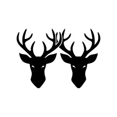 Naklejka premium Two black silhouettes of deer heads facing forward