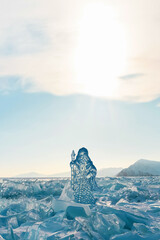 Ice sculpture of Santa Claus on Lake Baikal. Copy space.