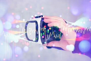 Close-up of hands holding virtual reality goggles with overlay of futuristic glowing bokeh lights. Concept of VR-technologies in investment analytics, digital innovation.