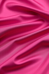 Obraz premium magenta purple pink silk satin fabric background