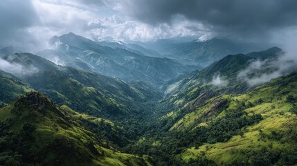 Fototapeta premium Lush green Mountains of the Western Ghats covered by morning mist and clouds, India landscape between Pune and Mahabaleshwar