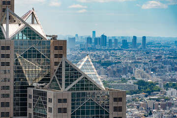 Tokyo skyline and reflections from metropolitan government building