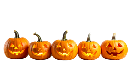 An orange carved Halloween jack-o-lantern pumpkin with a scary face In a row isolated on a white background