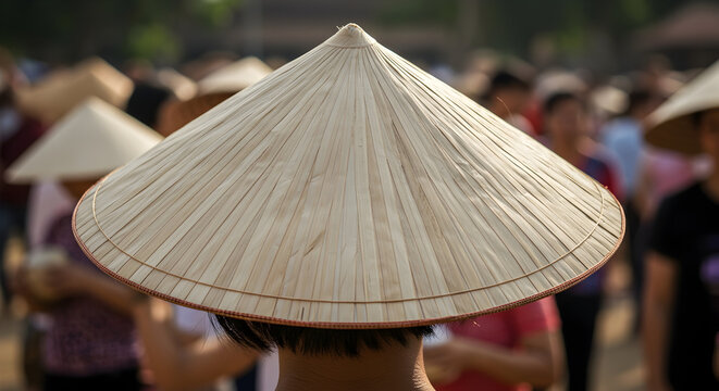 A fan wearing a traditional hat from their country.